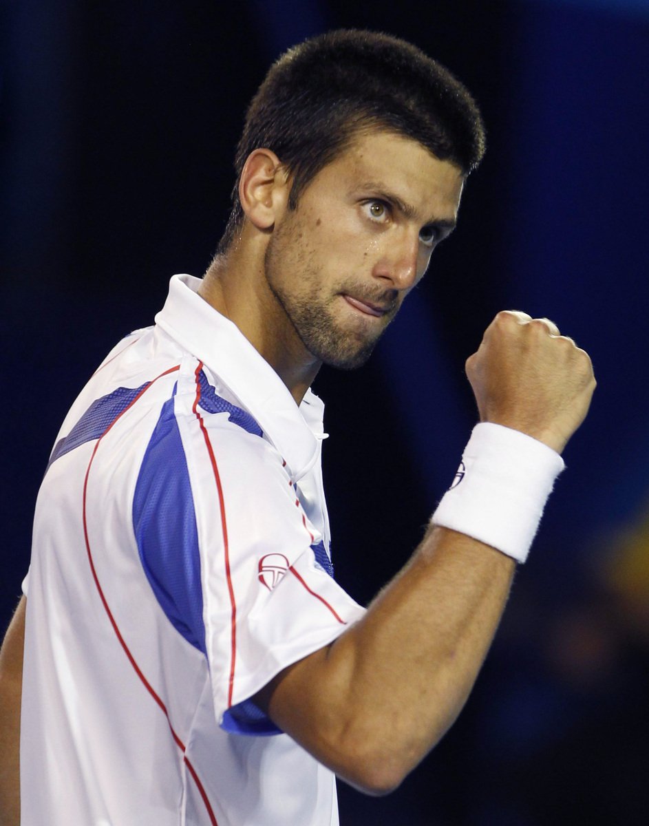 Srb Novak Djokovič se raduje z vítězného míče proti Tomáši Berdychovi ve čtvrtfinále Australian Open