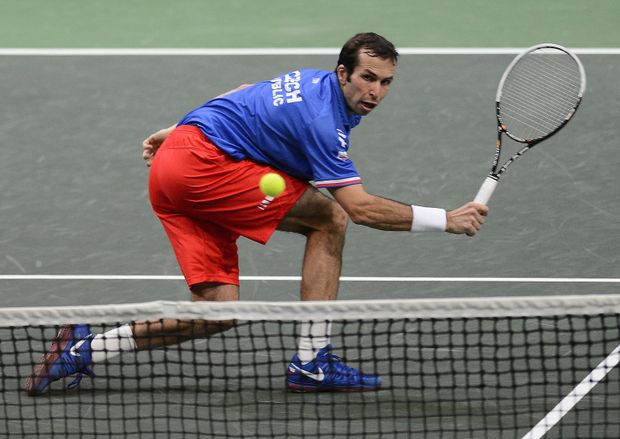 Radek Štěpánek v akci během čtyřhry Radek Štěpánek v akci během čtyřhry