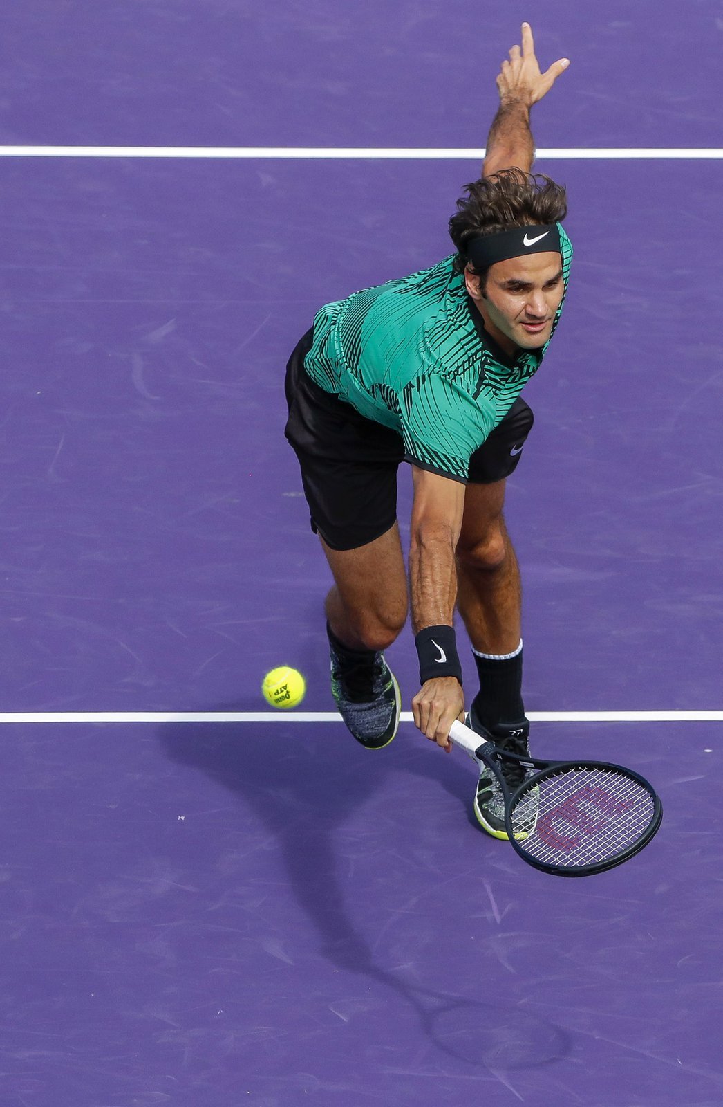 Roger Federer v zápase s Tomášem Berdychem