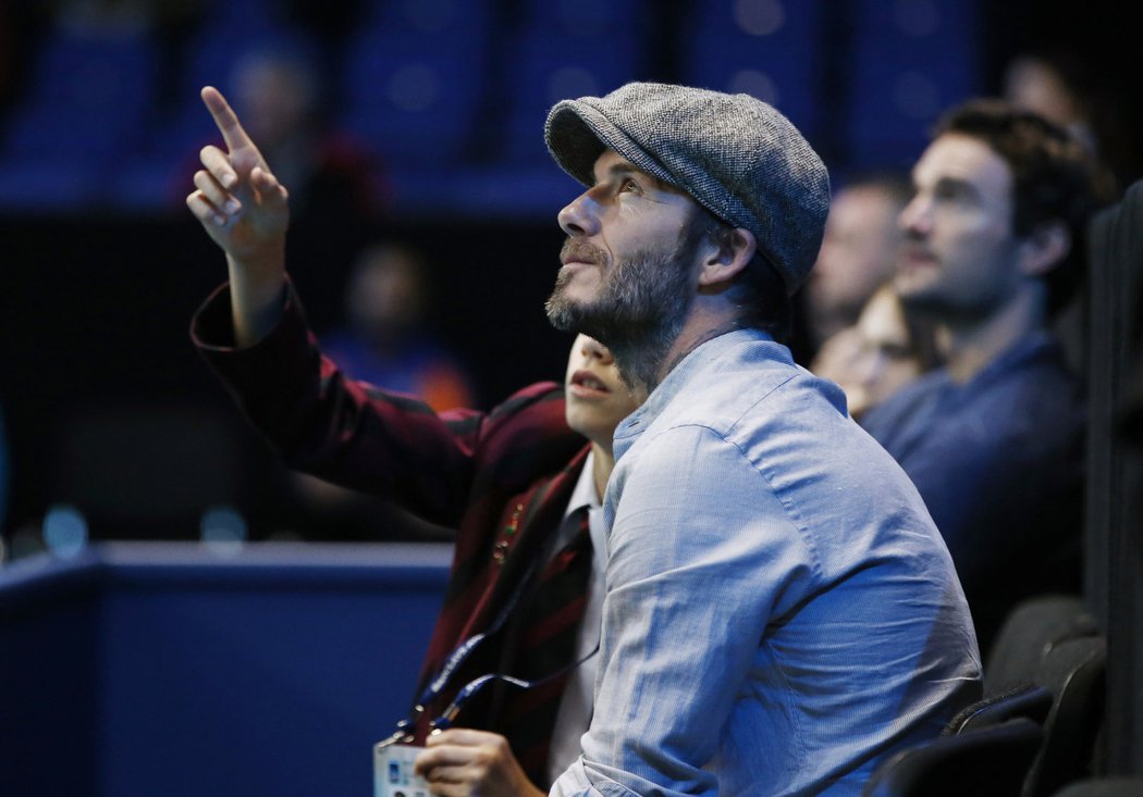 Fotbalista David Beckham vzal na tenisový Turnaj mistrů syna Romea.