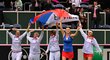 2014. Po vítězství nad Němkami slaví fedcupový triumf Hradecká, Andrea Hlaváčková, Karolína Plíšková, Petra Kvitová a Lucie Šafářová.