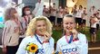 Zlaté tenistky Kateřinu Siniakovou a Barboru Krejčíkovou vítal v olympijské vesnici aplaus.