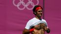 Sekáč Roger během tréninku ve slavném All England Clubu