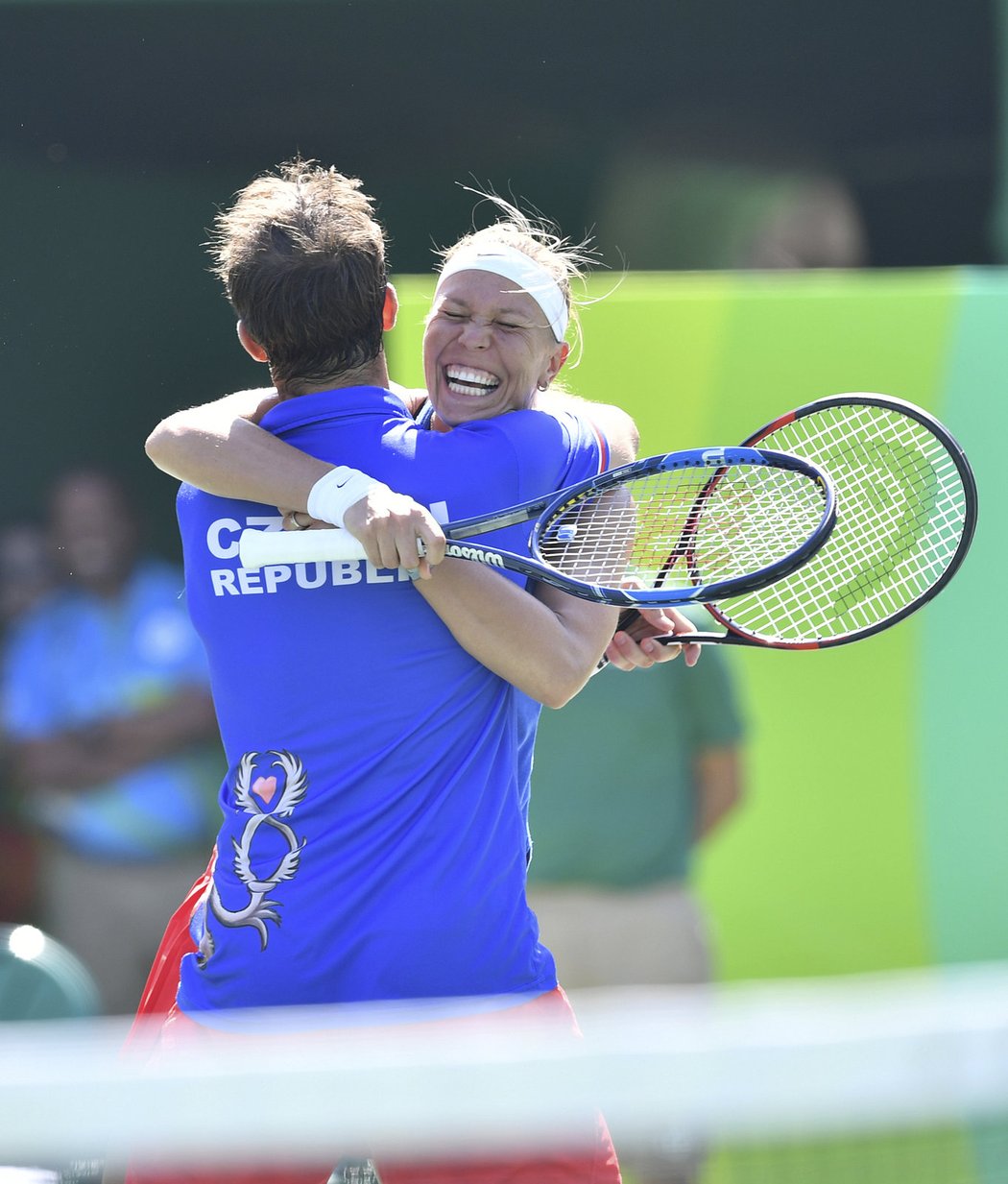 Radek Štěpánek a Lucie Hradecká slaví bronz