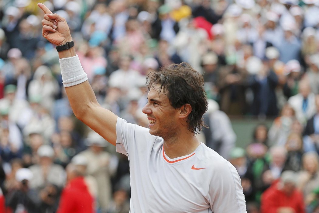 Rafael Nadal ve finále French Open porazil Davida Ferrera a poosmé ovládl antukový grandslam v Paříži