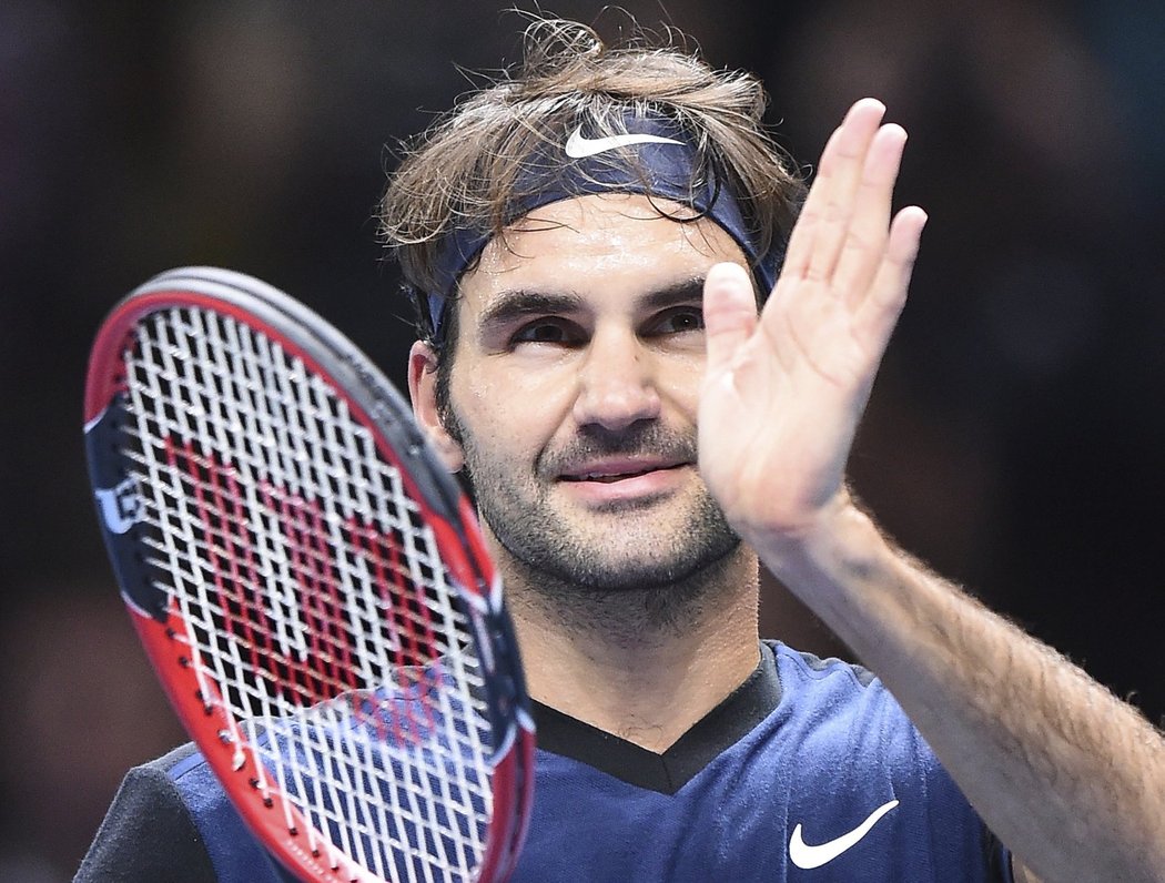 Roger Federer se raduje po vítězství nad Keiem Nišikorim na Turnaji mistrů