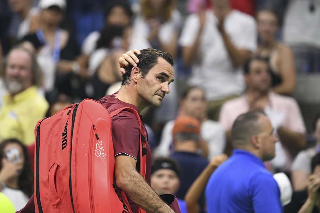 Pětinásobný vítěz tenisového US Open Švýcar Federer skončil v New Yorku už v osmifinále. Australan Millman, 55.hráč světa, ho porazil 3:6,7:5,7:6,7:6.