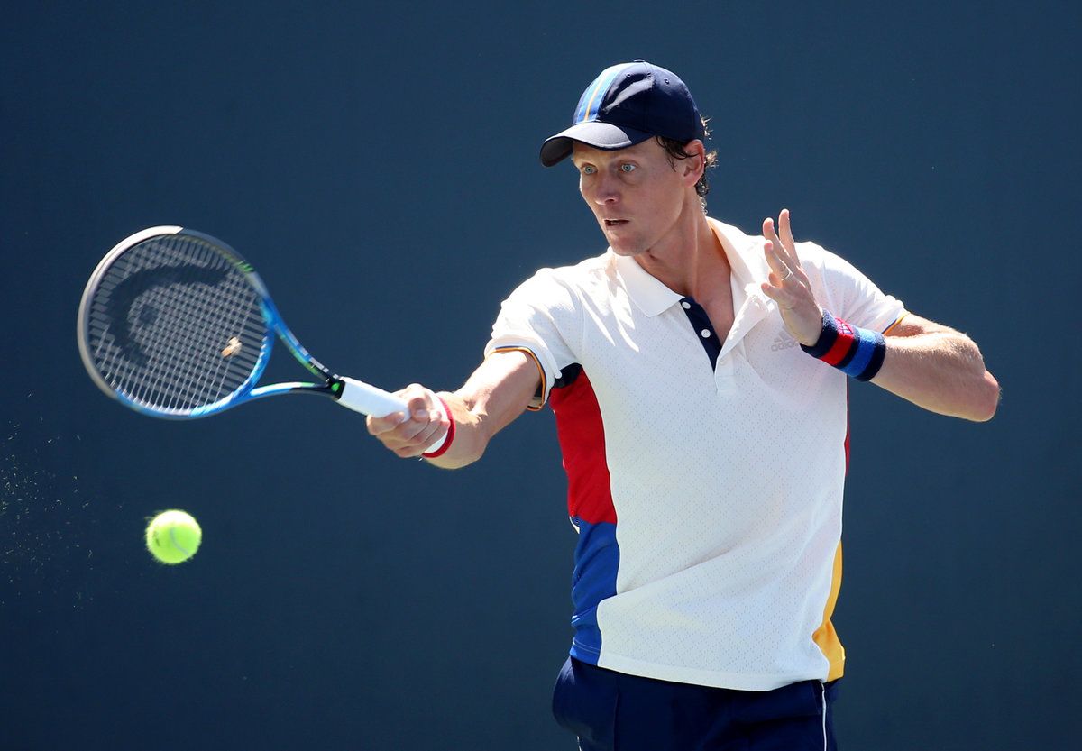 Tomáš Berdych během dvojhry na US Open s Ryanam Harrisonem