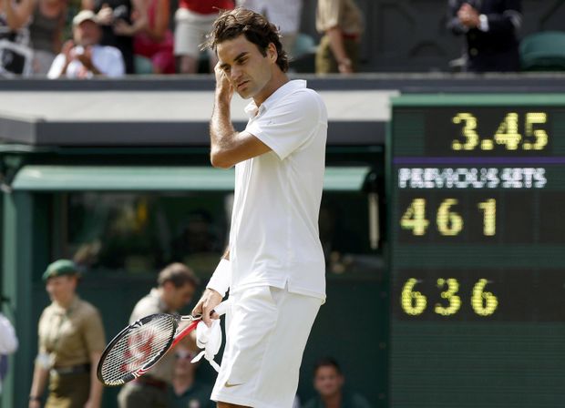 Roger Federer po porážce od Tomáše Berdycha ve čtvrtfinále Wimbledonu Roger Federer po porážce od Tomáše Berdycha ve čtvrtfinále Wimbledonu