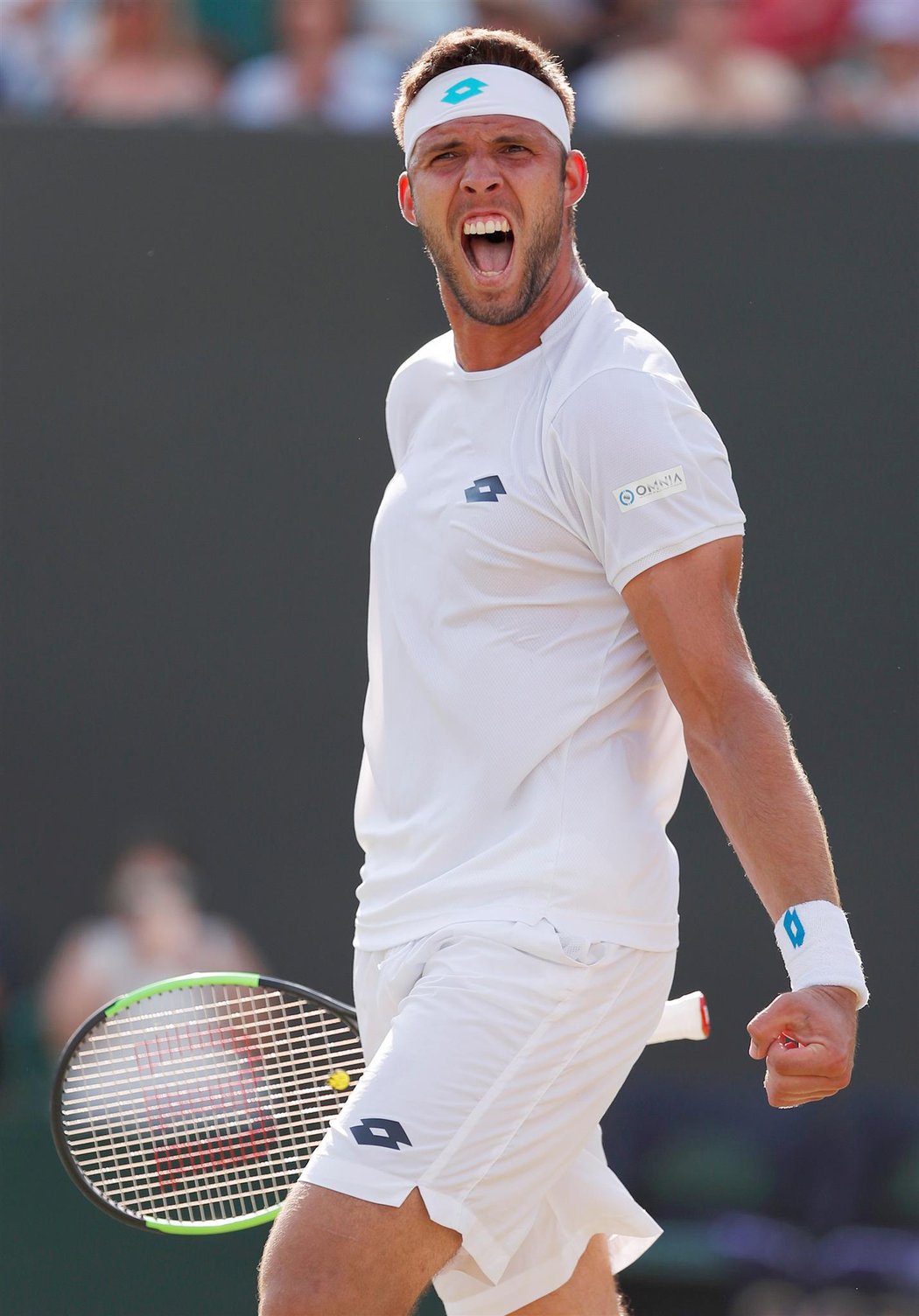 Český tenista Jiří Veselý během turnaje ve Wimbledonu, kde se mu na trávě hodně dařilo