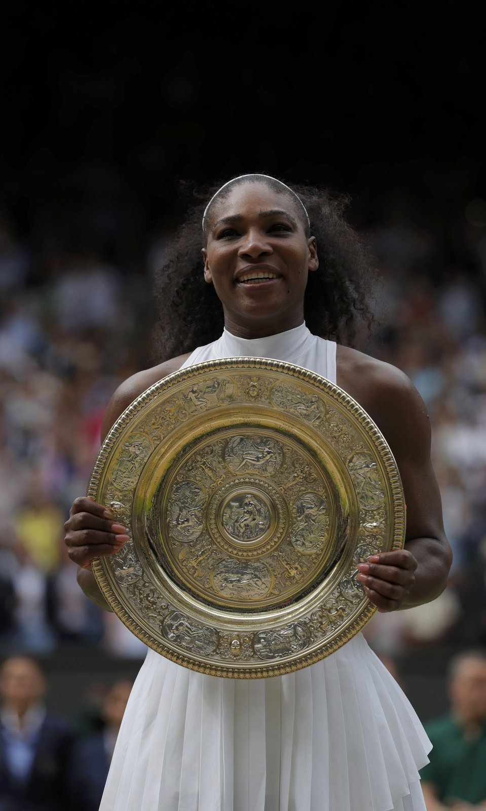 Šťastná Serena Williamsová po triumfu ve Wimbledonu.