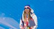 Rozesmátá Ester Ledecká se zlatou medailí za paralelní obří slalom snowboardistek