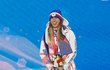 Rozesmátá Ester Ledecká se zlatou medailí za paralelní obří slalom snowboardistek Rozesmátá Ester Ledecká se zlatou medailí za paralelní obří slalom snowboardistek