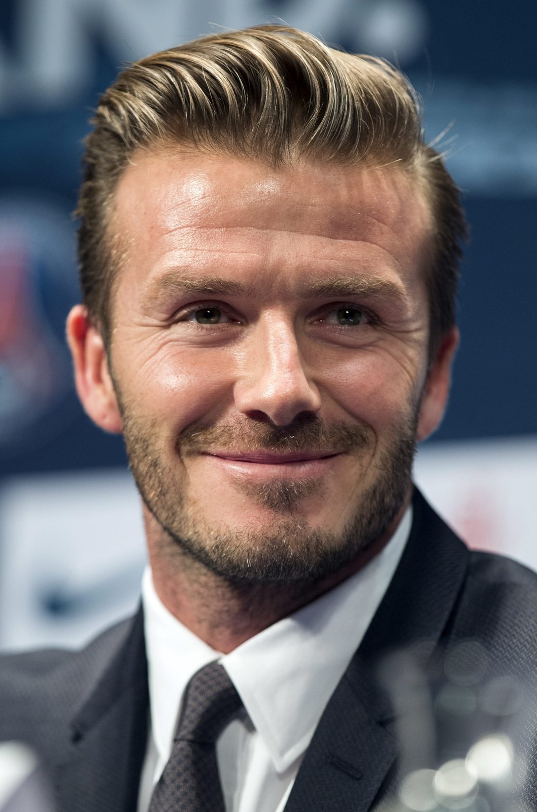 epa03563050 English soccer player David Beckham during a news conference to announce his signing with Paris Saint Germain, at the Parc des Princes stadium in Paris, France, 31 January 2013. Beckham has been without a club since completing a five-year contract at Major League Soccer club Los Angeles Galaxy and was lately keeping fit at England&#39;s Arsenal. He is England&#39;s record capped international with 115 appearances, and his clubs apart from the Galaxy were Manchester United, Real Madrid and AC Milan. PSG, who are under Qatari ownership, have been spending big over the past years, signing the likes of Zlatan Ibrahimov, Thiago Silva and Javier Pastore. They are joint Ligue 1 leaders with Olympique Lyon and reportedly already after Beckham last year.  EPA/IAN LANGSDON