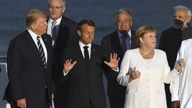 Summit G7 projednával obchodní války i krizi kolem Íránu: Americký prezident Donald Trump, francouzský prezident Emmanuel Macron a německá kancléřka Angela Merkelová (26. 8. 2019)