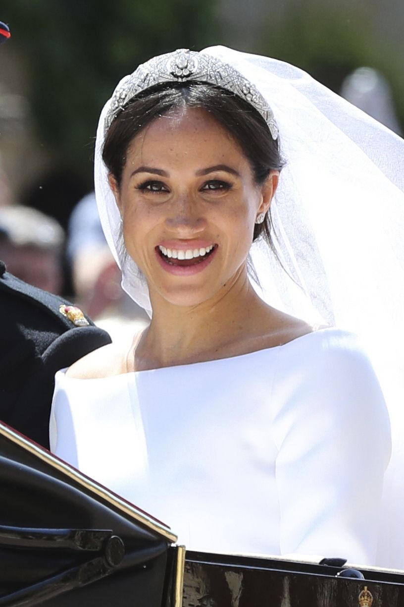 Meghan Markle měla svatební šaty od návrhářky Clare Keller Waight z domu Givenchy.