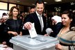 Syrský prezident Bašár Asad u voleb. Podle opozice a Západu nebyly legitimní