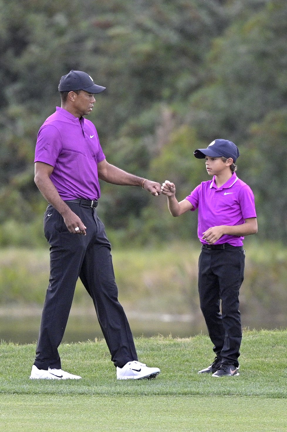 Golfista Tiger Woods se synem