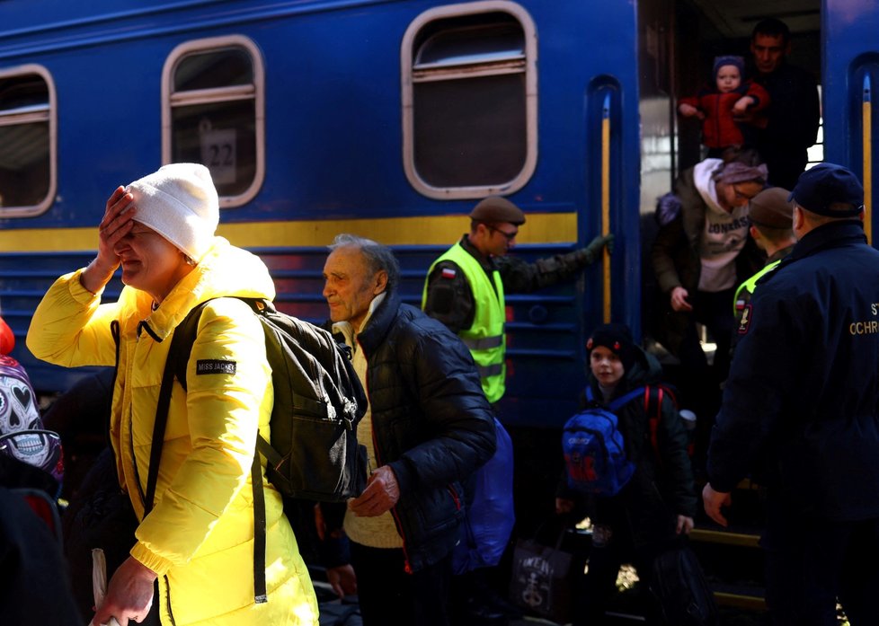 Lidé, kteří prchli z Ukrajiny před válkou, v polské Přemyšli. (21.3.2022)