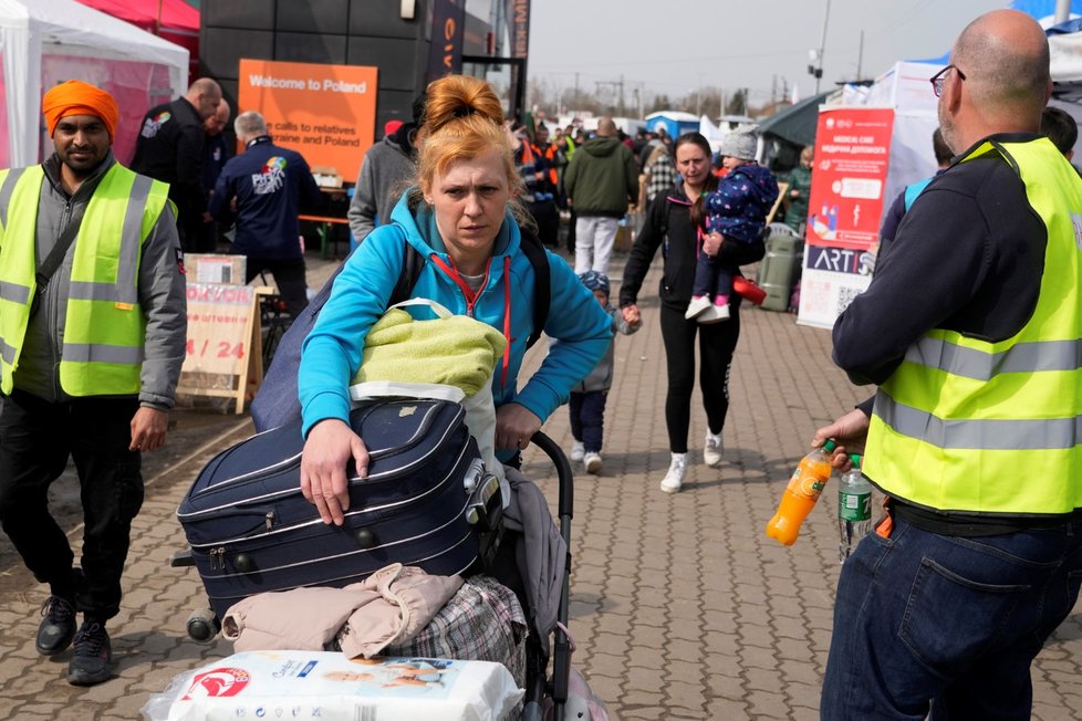 Ukrajinští uprchlíci na hraničním přechodu Medyka. (30. 3. 2022)