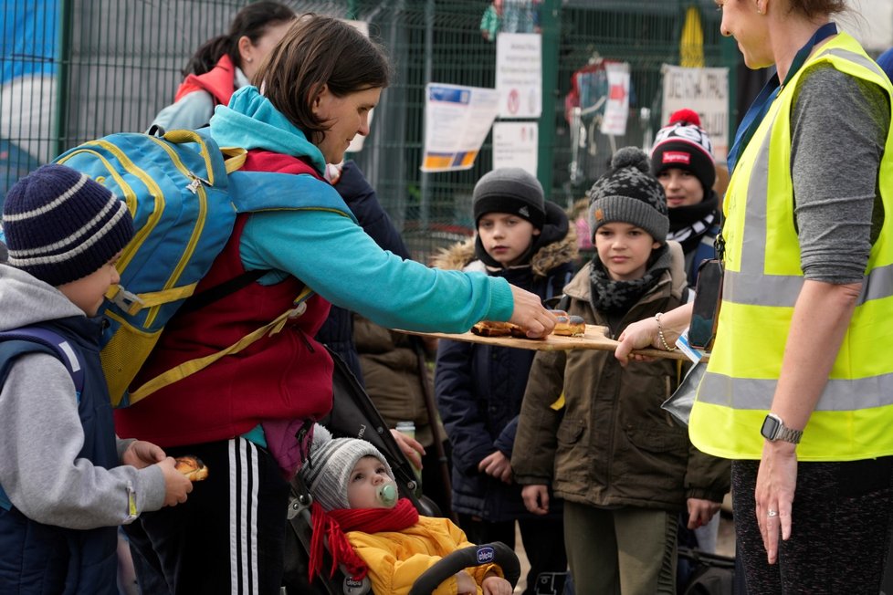 Ukrajinští uprchlíci na hraničním přechodu Medyka. (30. 3. 2022)