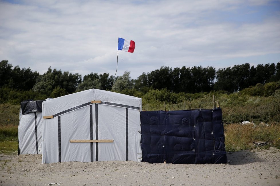 Uprchlíci z francouzského Calais žijí v táboře New Jungle (Nová džungle)