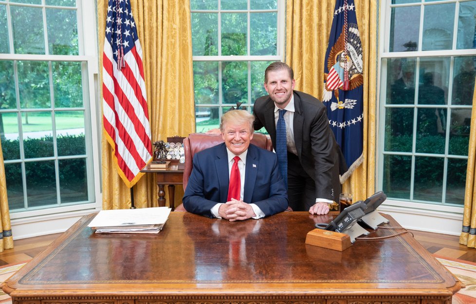 Prezident Trump se synem Ericem.