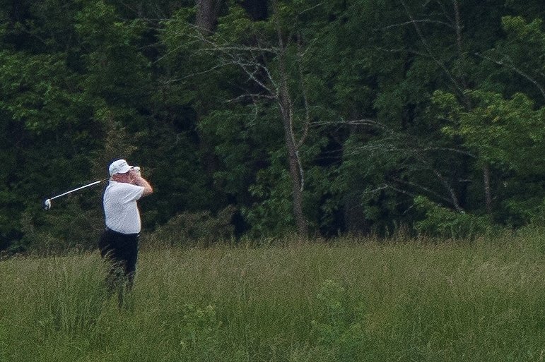 Prezident USA Donald Trump na golfu.