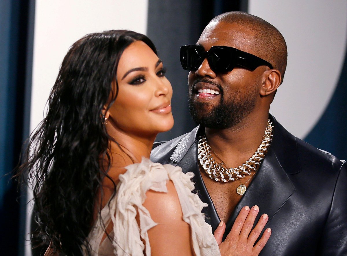 Americký rapper Kanye West s manželkou Kim Kardashianovou.