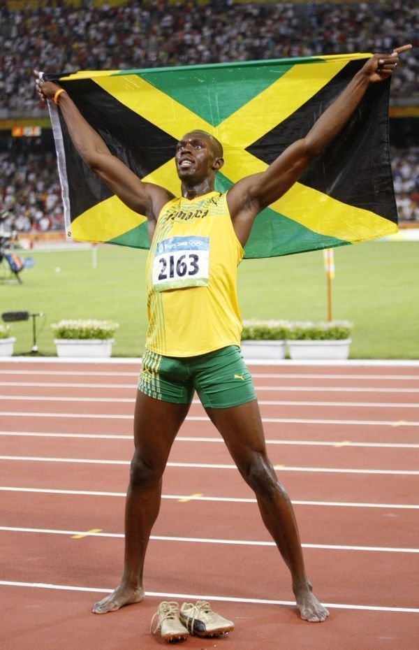 Usain Bolt a jeho radost po světovém rekordu na stovce