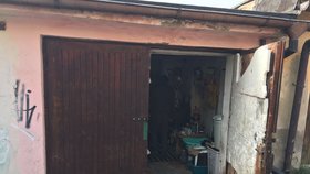 Bez vody, topení a s bezdomovcem. Matka se třemi dětmi živořila v Ústí v garáži
