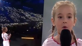 Ukrajinská dívenka, která zpívala v krytu známou píseň, je v bezpečí v Polsku. Zazpívala tam na koncertě!