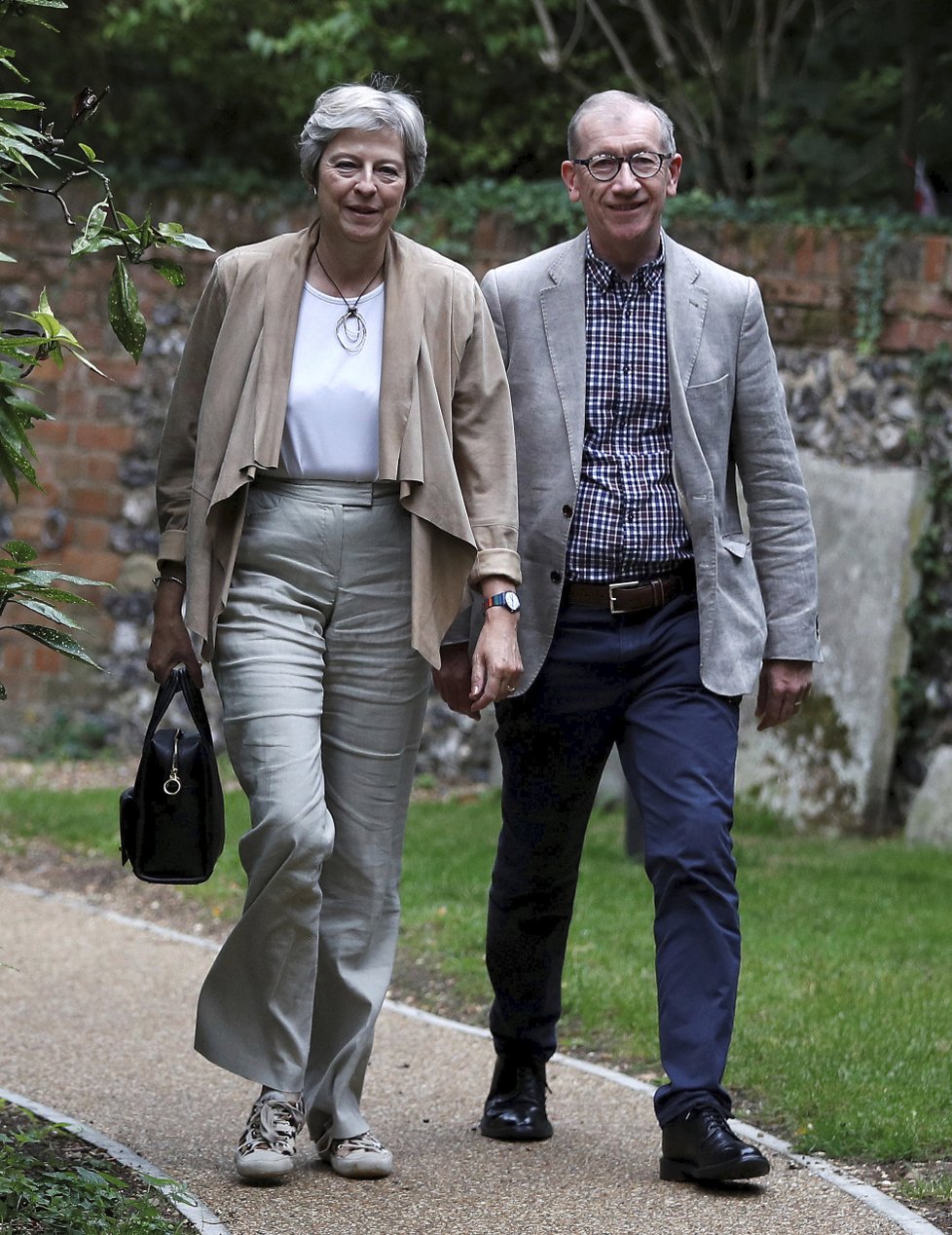Britská premiérka Theresa Mayová s manželem Philipem.