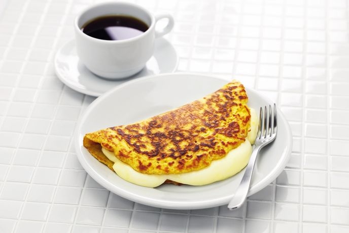 Cachapas, palačinky plněné našlehaným sýrem Cachapas, palačinky plněné našlehaným sýrem