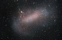 Příkladem trpasličí galaxie je Velké Magellanovo mračno. Jedná se o satelitní galaxii naší Galaxie