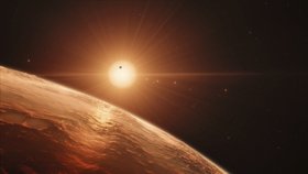 Takhle si umělci představují, že vypadá povrch jedné z planet TRAPPIST-1.