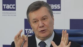Bývalý ukrajinský prezident Viktor Janukovyč na tiskovce v Moskvě