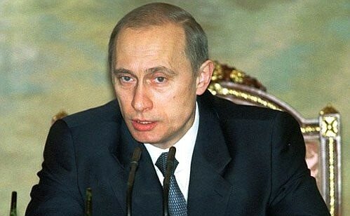 Vladimir Putin (2002).