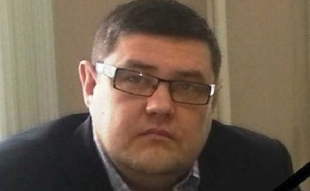 Ruský novinář Dimitrij Popkov.