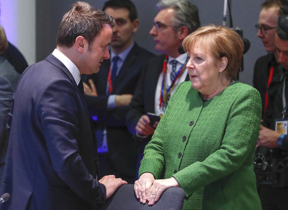 Lucemburský premiér Xavier Bettel s německou kancléřkou Merkelovou