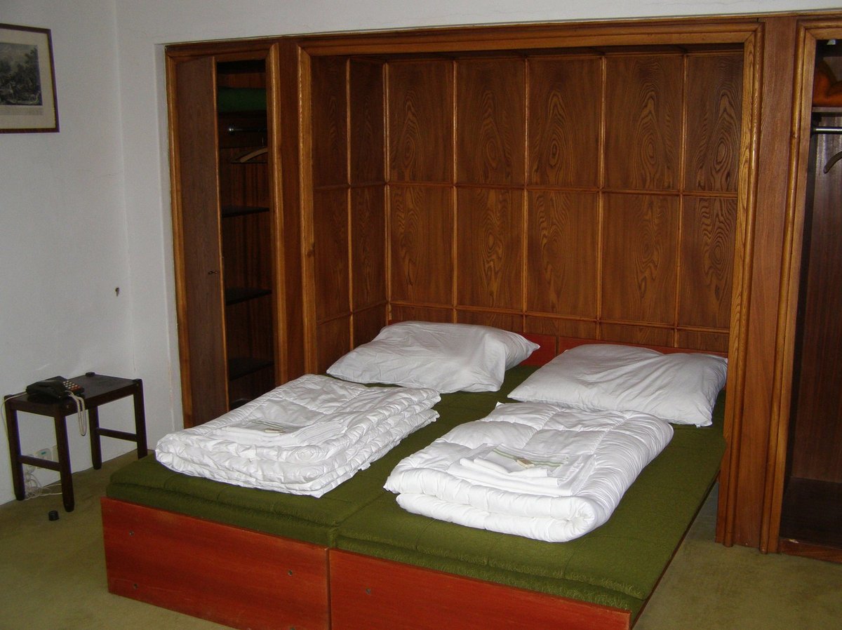 Jeden z pokojí sloužící jako ložnice.